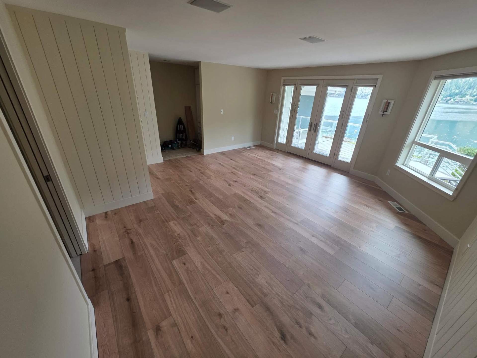 Luxury vinyl plank flooring installation in a Manson WA lake home by Garcia Home Renovations
